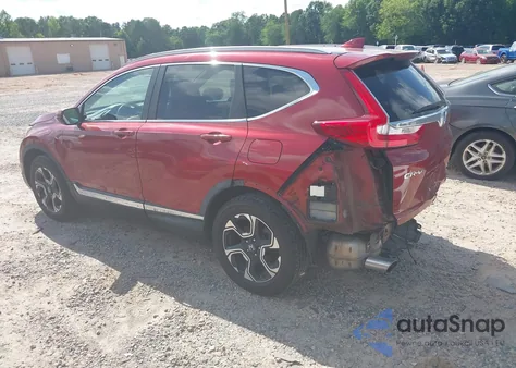 2017 Honda Cr-V Touring z USA, uszkodzony, nr VIN 5J6RW2H92HL063870